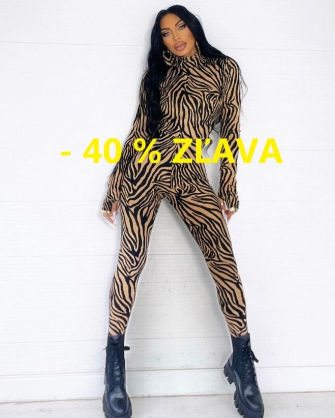 Cena 35€❤️ - 40 % ZĽAVA🔥🔥 Elastický vzorovaný overal s dlhým rukávom ktorý zvýrazní vaše krivky💋💋Posledný kus. Veľkosť XS...